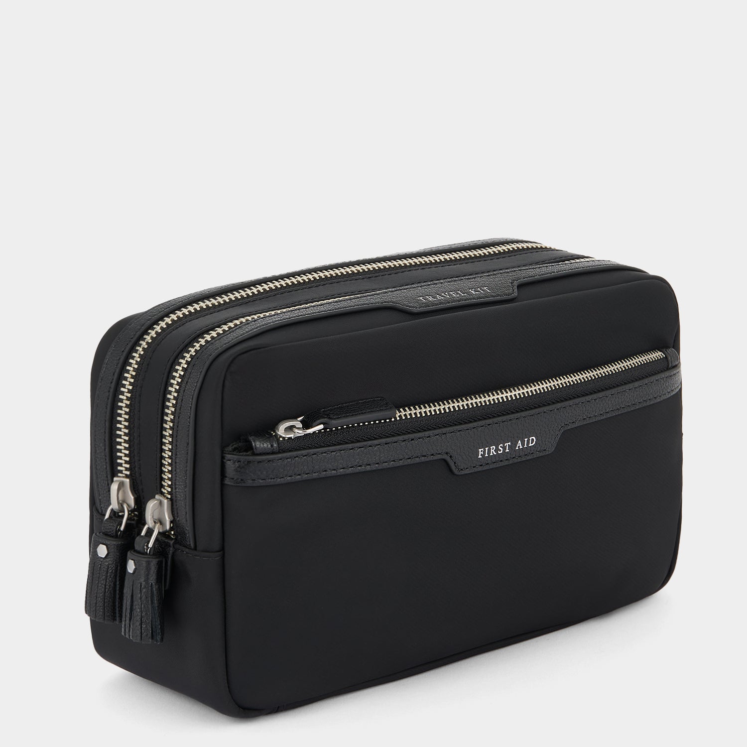 Travel Kit Pouch -

          
            Regenerated ECONYL® in Black -
          

          Anya Hindmarch UK
