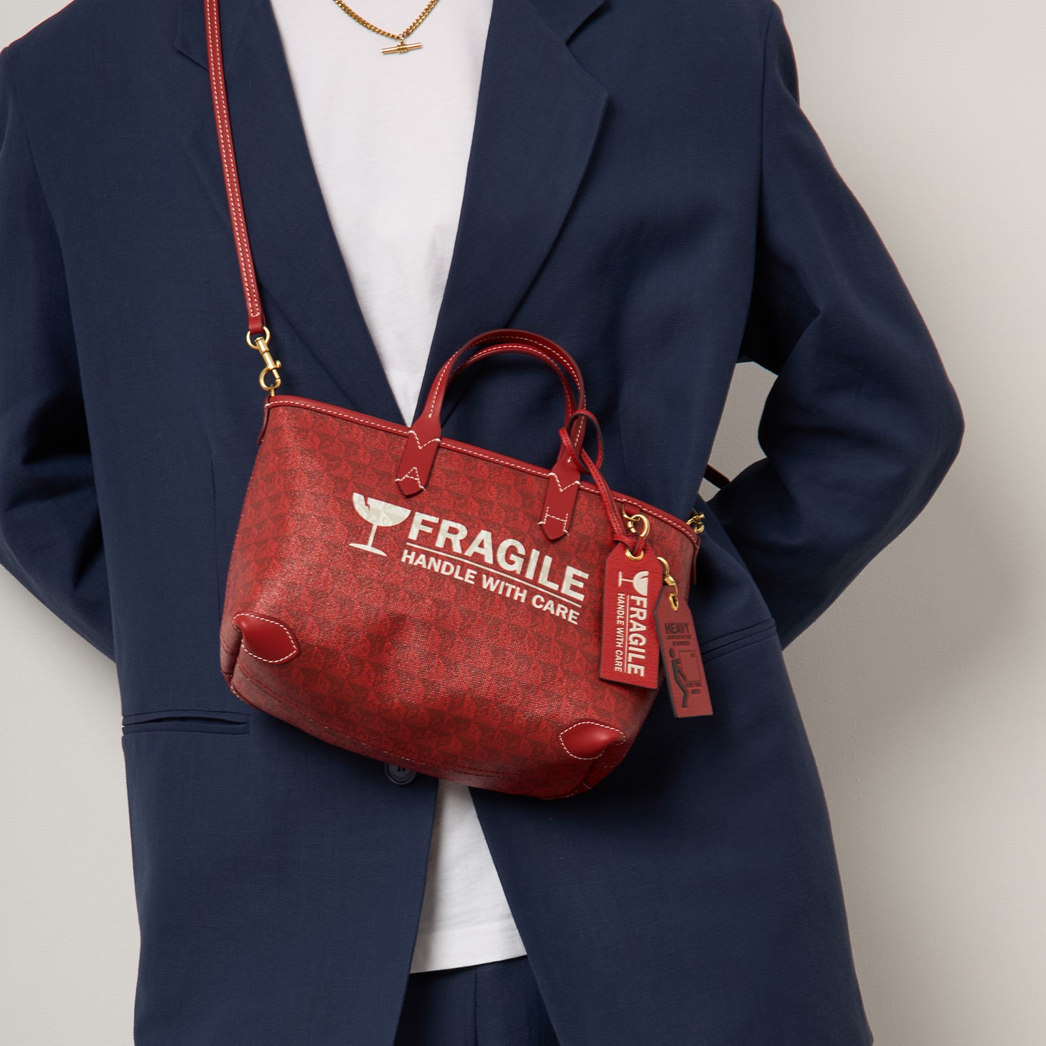 Fragile Luggage Label Charm -

          
            Capra Leather in Bright Red -
          

          Anya Hindmarch UK
