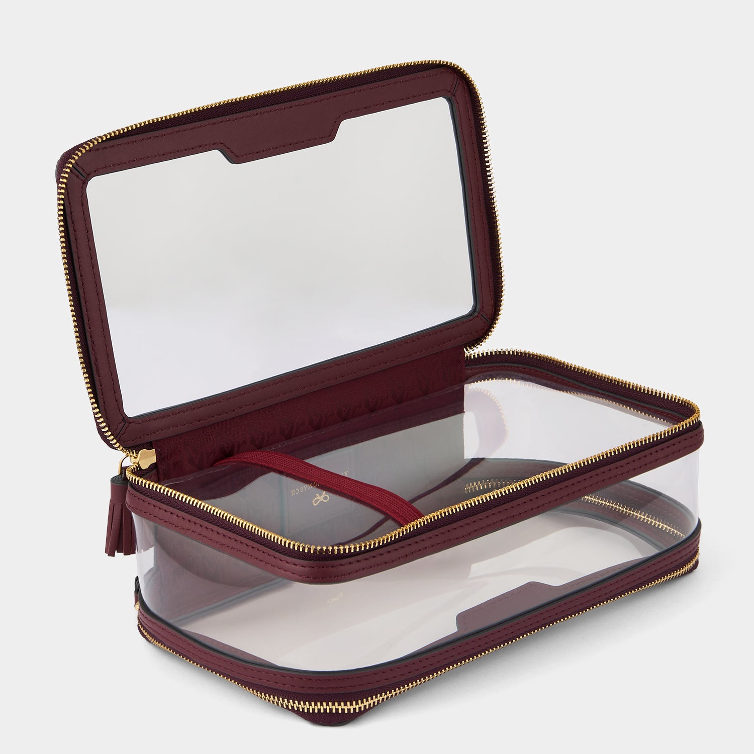 Logo In-Flight Case -

          
            Leather in Medium Red/TPU in Clear -
          

          Anya Hindmarch UK
