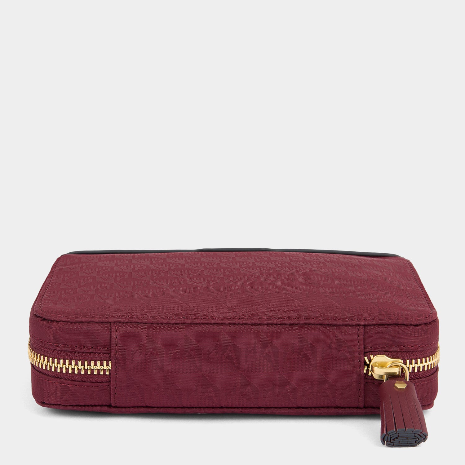 Logo Pills Box -

          
            Jacquard Nylon in Medium Red -
          

          Anya Hindmarch UK
