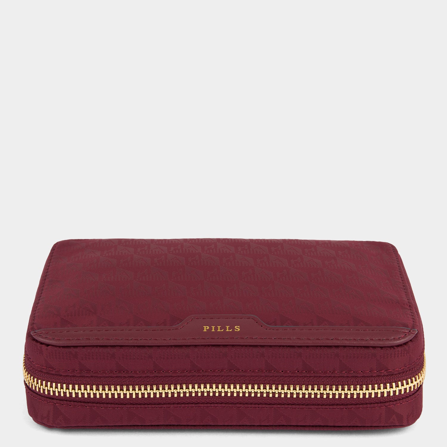 Logo Pills Box -

          
            Jacquard Nylon in Medium Red -
          

          Anya Hindmarch UK
