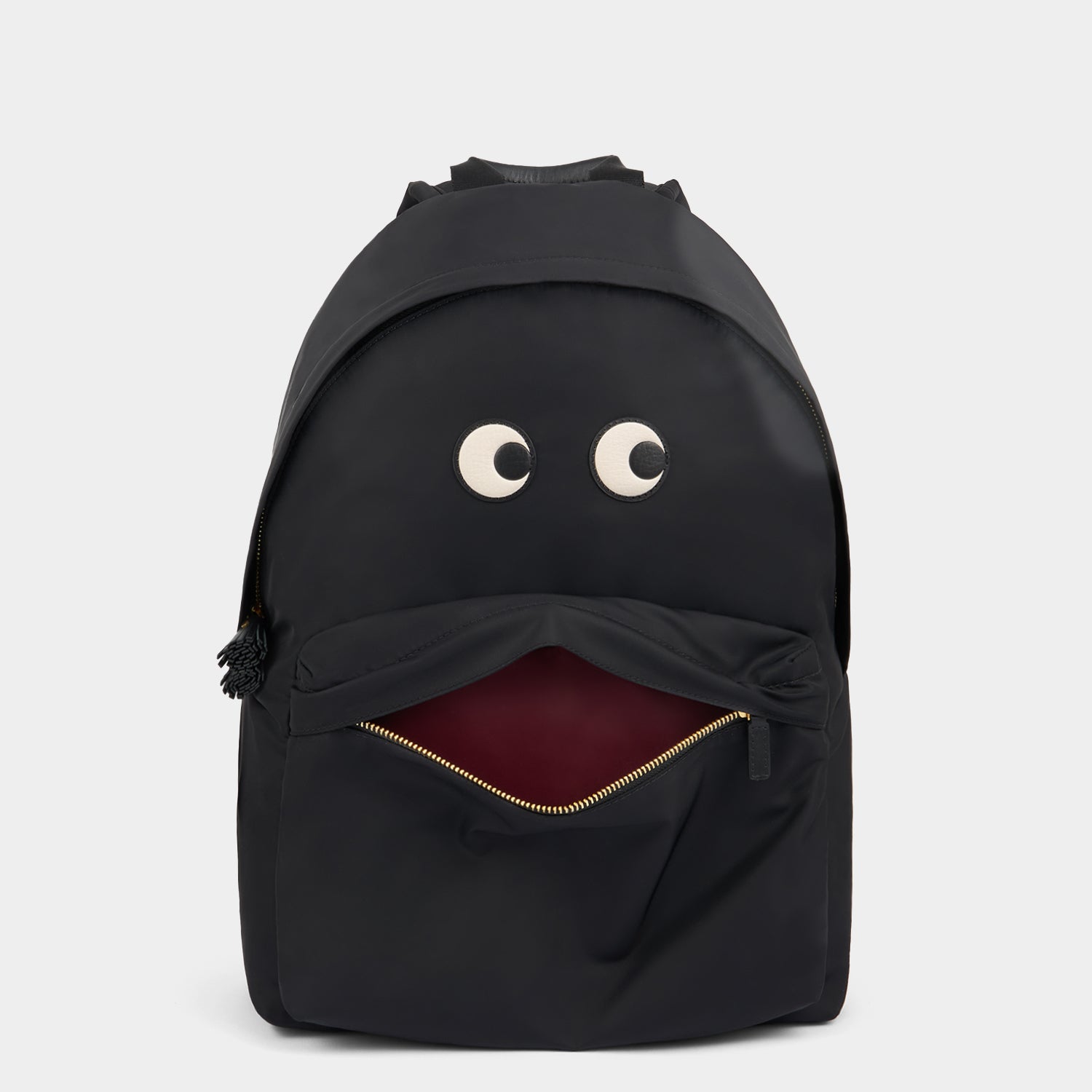 Eyes Backpack -

          
            Regenerated ECONYL® Nylon in Black -
          

          Anya Hindmarch UK
