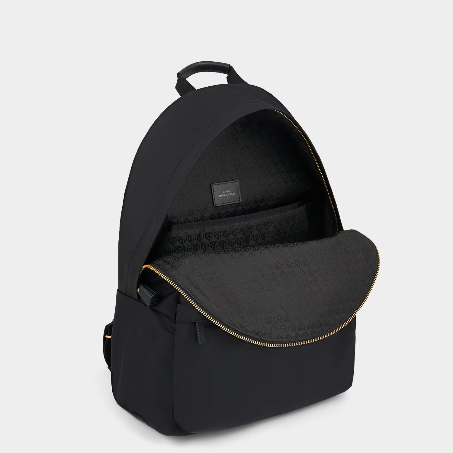 Eyes Backpack -

          
            Regenerated ECONYL® Nylon in Black -
          

          Anya Hindmarch UK
