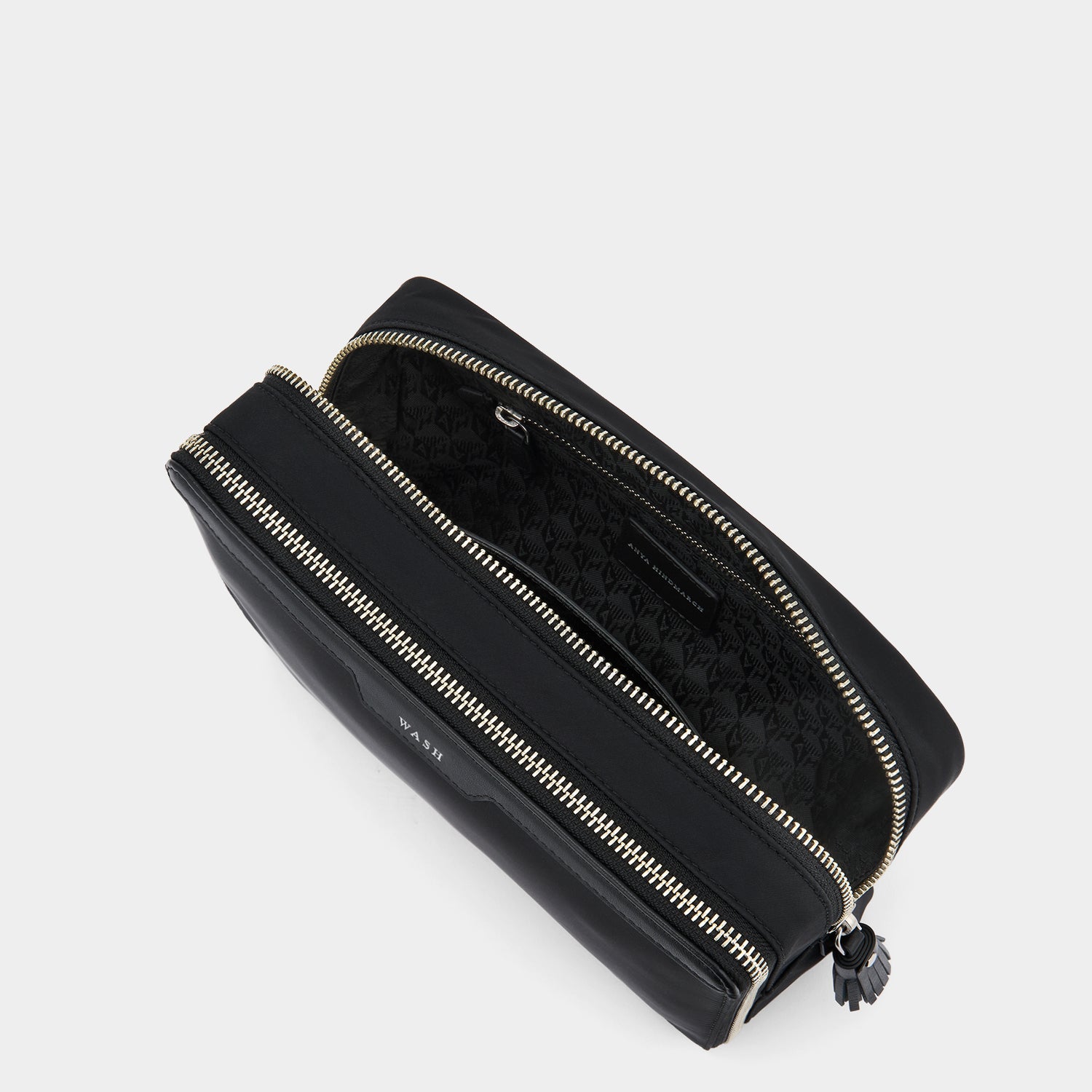 Wash Bag -

          
            Regenerated ECONYL® in Black -
          

          Anya Hindmarch UK
