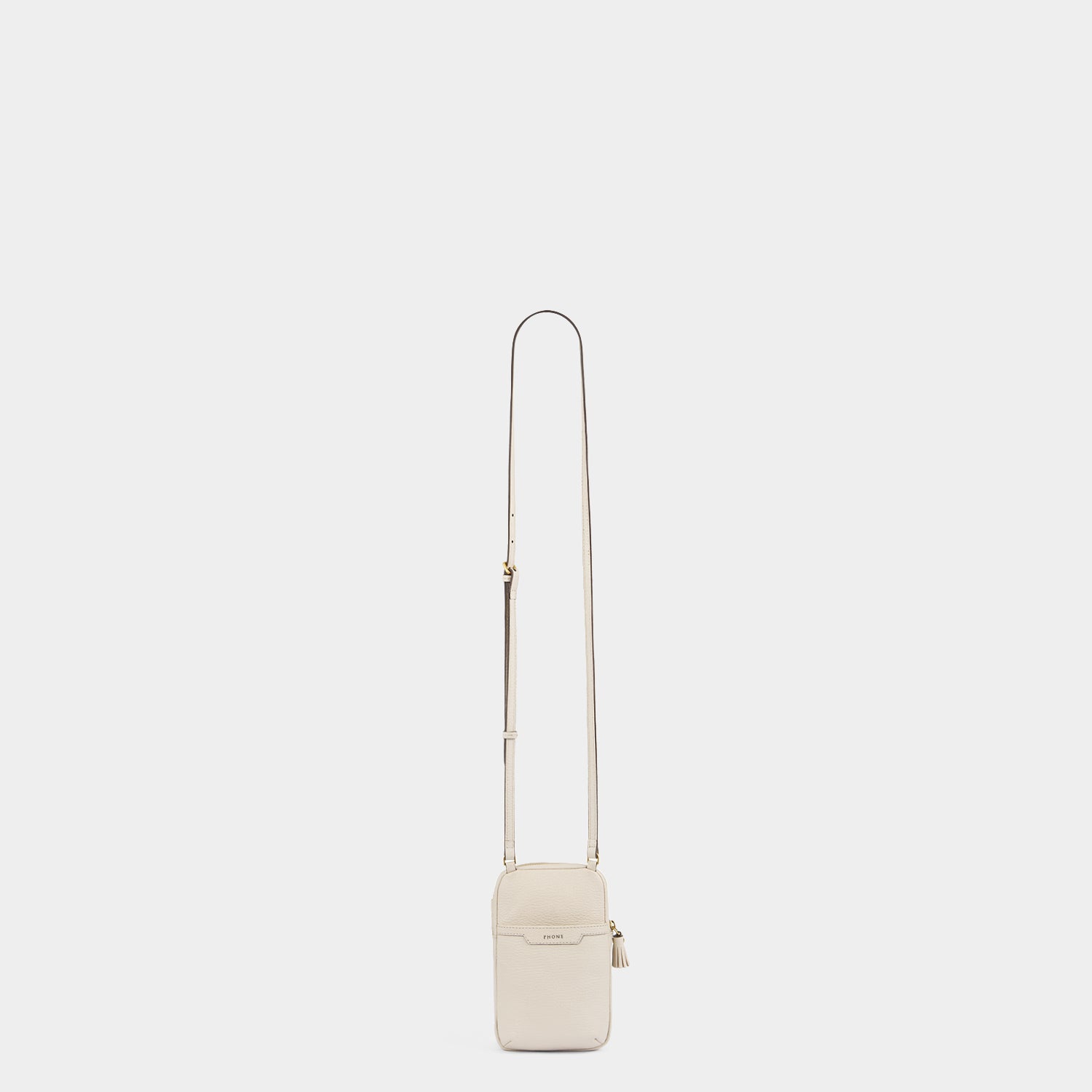 All Over Stickers Essential Cross-body -

          
            Capra Leather in Chalk -
          

          Anya Hindmarch UK
