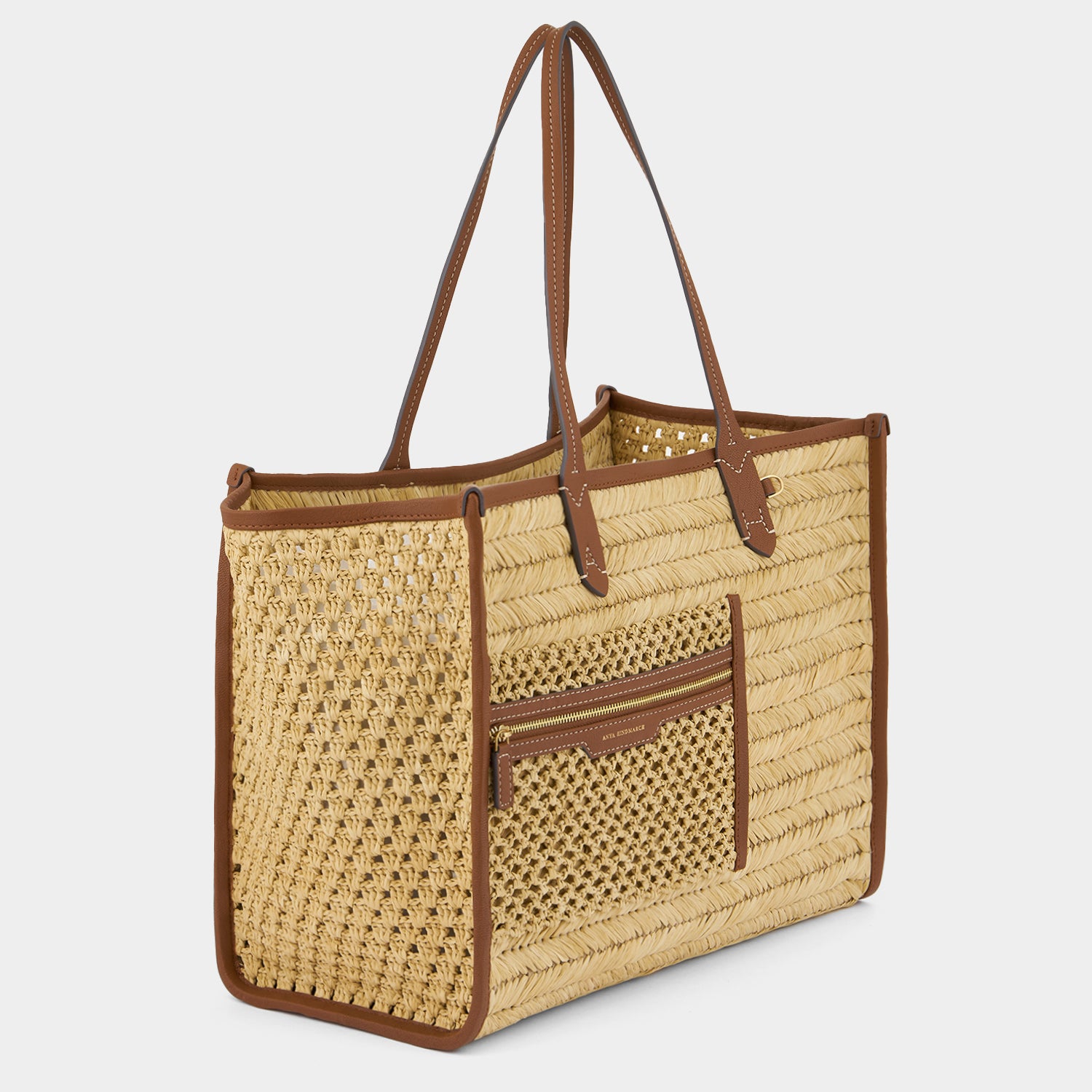 Raffia Pocket Tote -

          
            Raffia in Cedar -
          

          Anya Hindmarch UK
