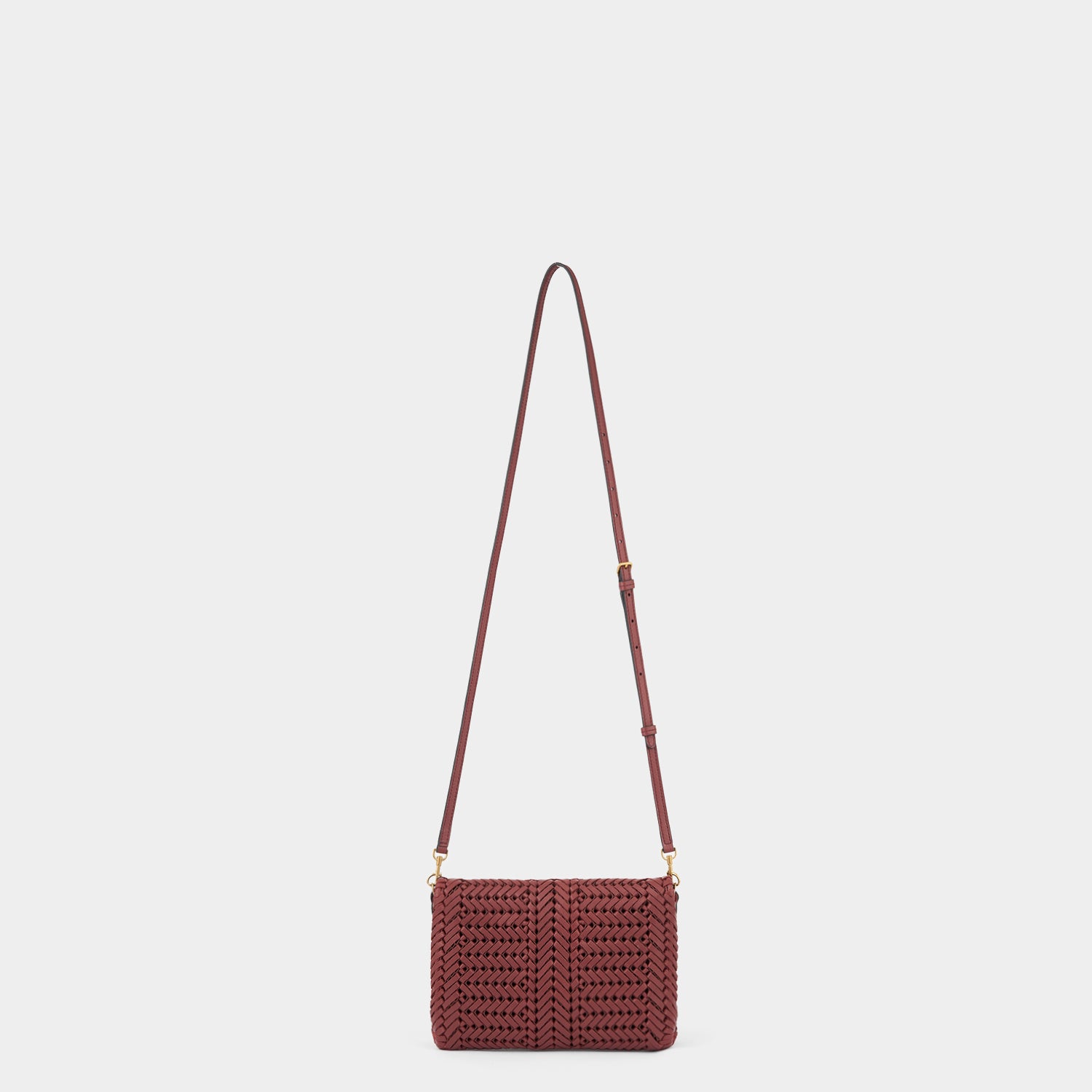 Neeson Cross-body -

          
            Capra Leather in Damson -
          

          Anya Hindmarch UK
