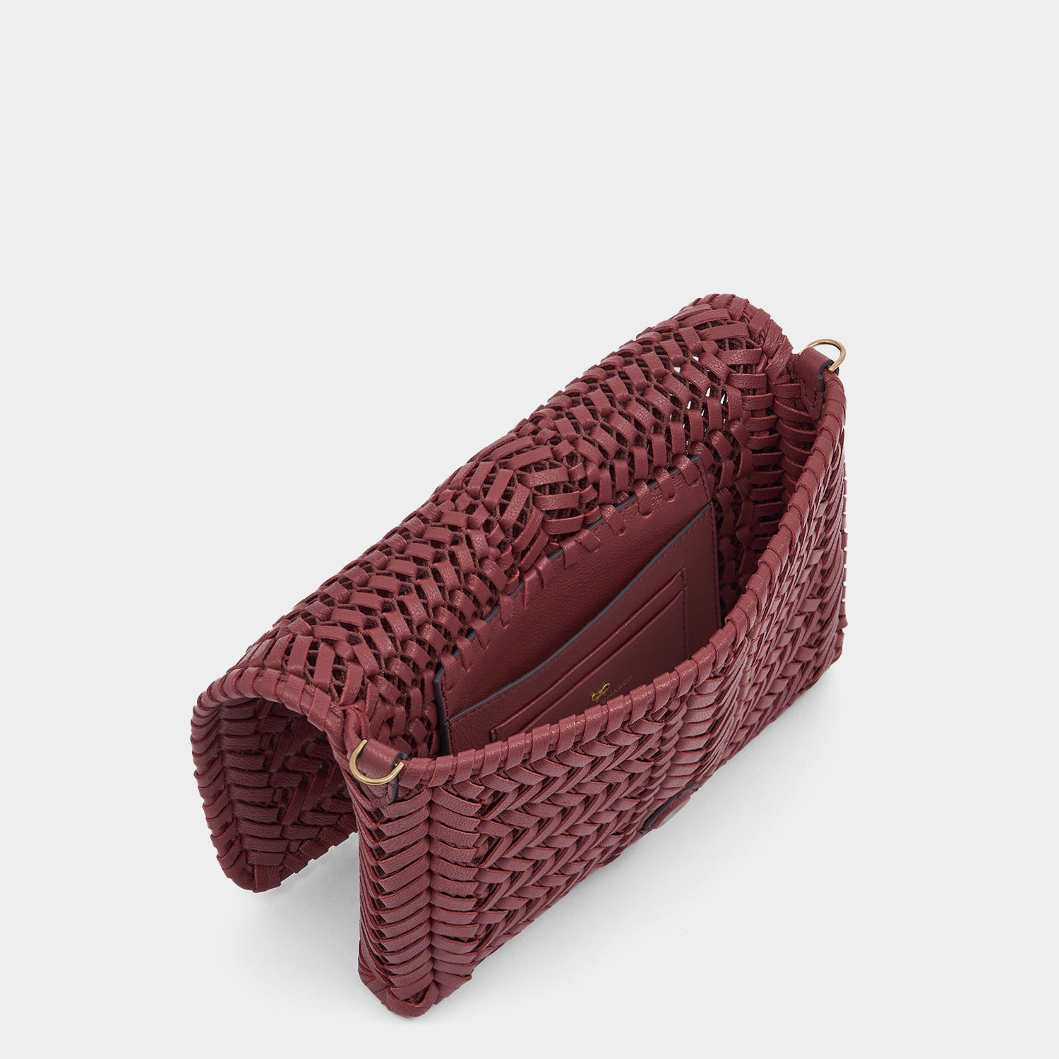 Neeson Cross-body -

          
            Capra Leather in Damson -
          

          Anya Hindmarch UK
