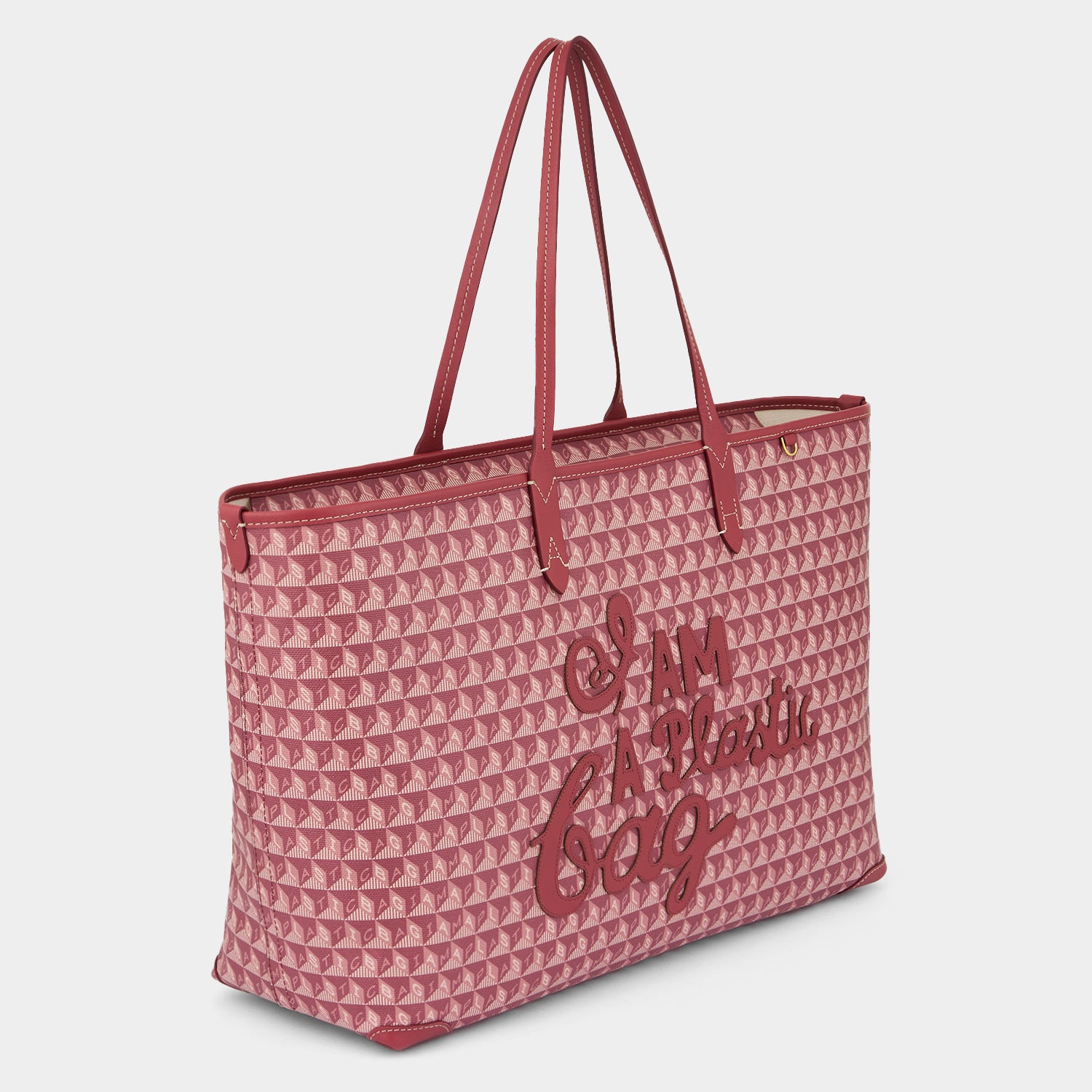 I Am A Plastic Bag Zipped Motif Tote -

          
            Recycled Canvas in Damson -
          

          Anya Hindmarch UK
