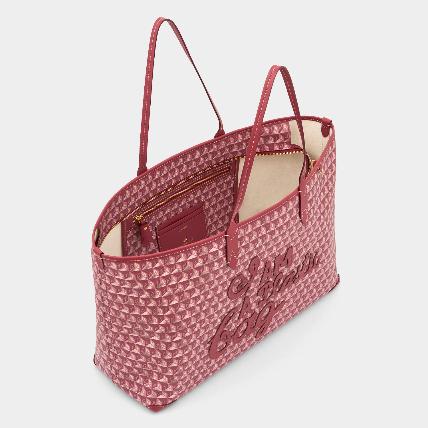 I Am A Plastic Bag Zipped Motif Tote -

          
            Recycled Canvas in Damson -
          

          Anya Hindmarch UK
