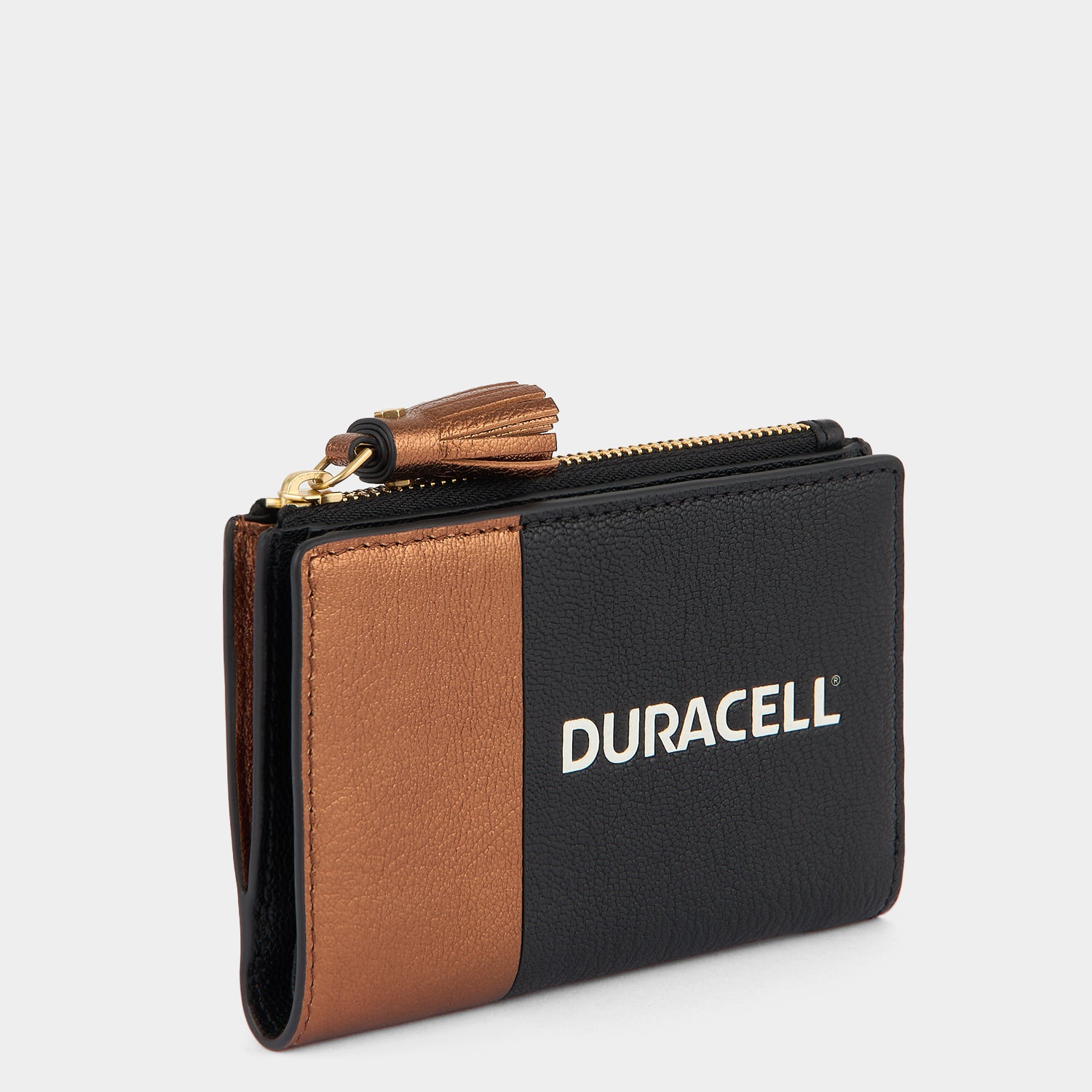 Anya Brands Duracell Folding Wallet -

          
            Capra Leather in Black/Gold -
          

          Anya Hindmarch UK
