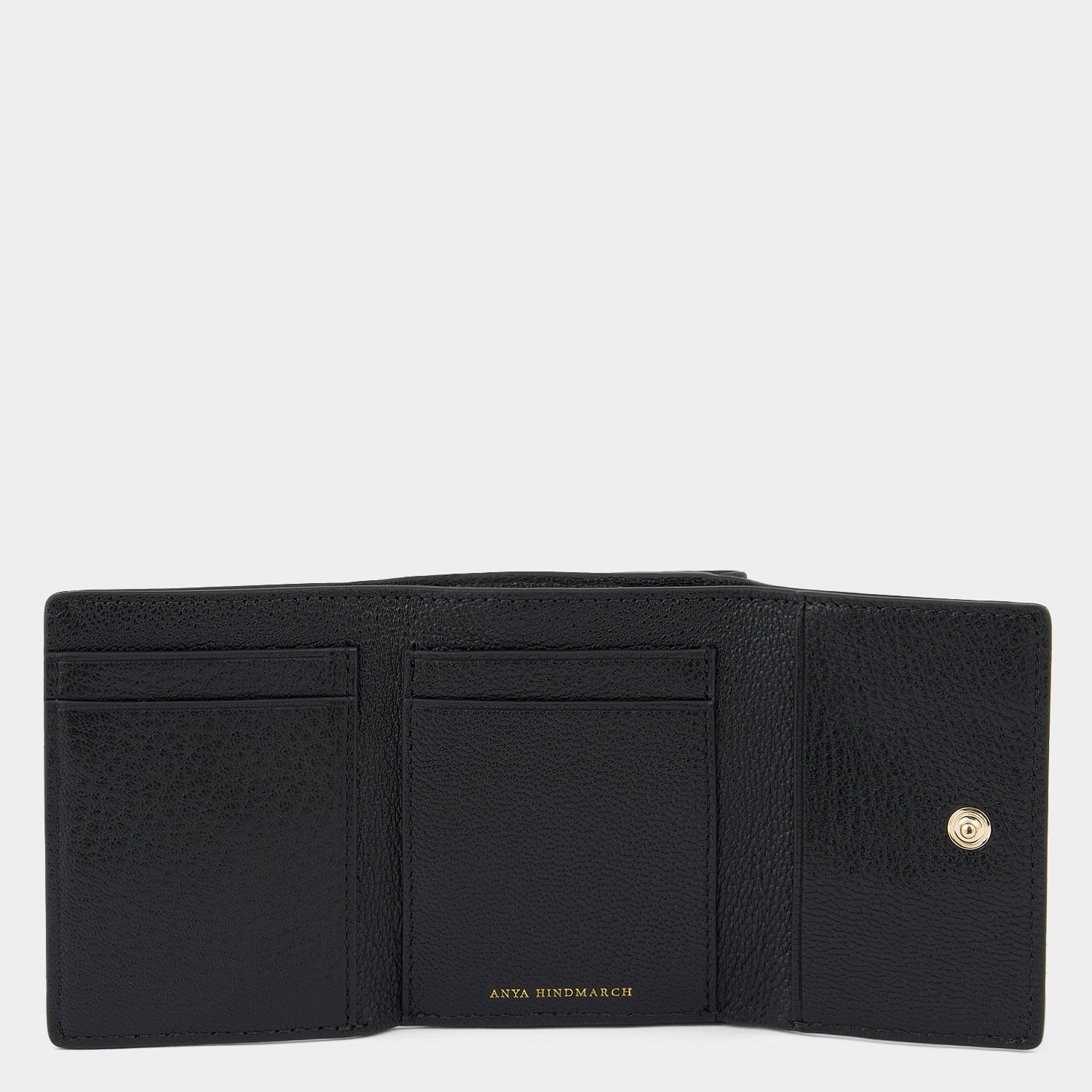 Eyes Mini Trifold Zip Wallet -

          
            Capra Leather in Black -
          

          Anya Hindmarch UK
