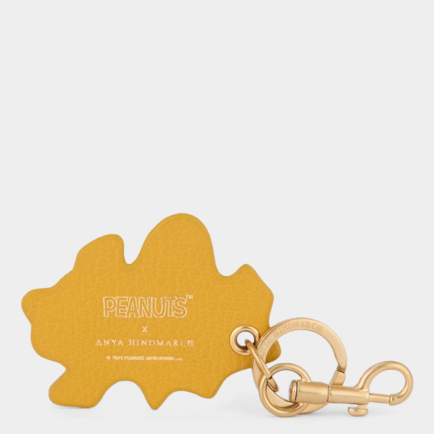 Peanuts Woodstock Key Charm -

          
            Capra Leather in Mustard -
          

          Anya Hindmarch UK
