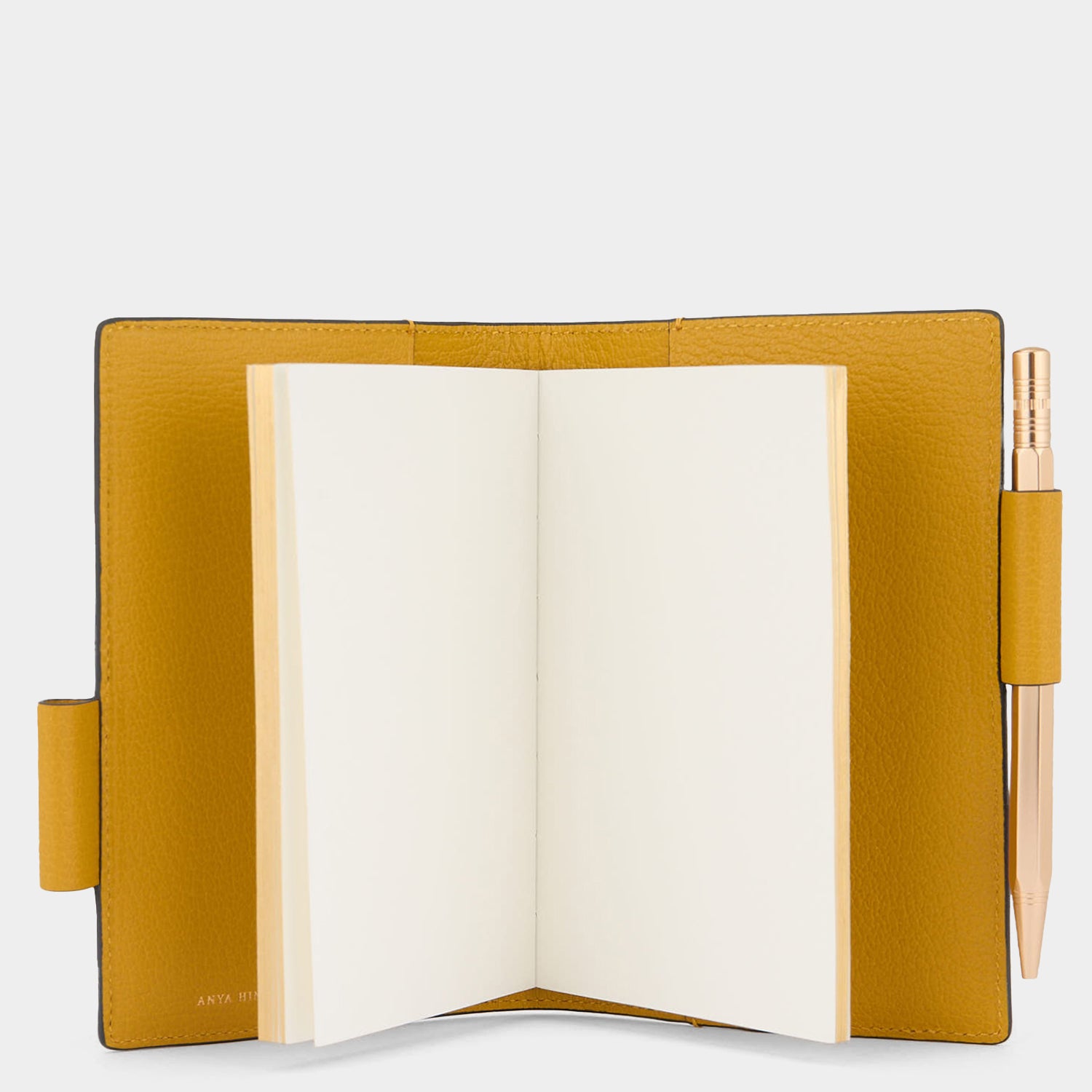 Peanuts Snoopy A6 Journal -

          
            Capra Leather in Mustard -
          

          Anya Hindmarch UK
