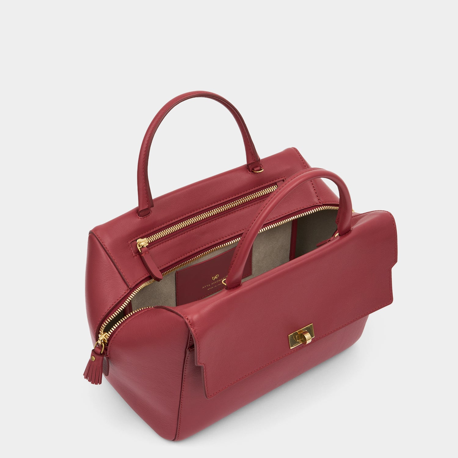 Seaton Cross-body -

          
            Calf Leather in Damson -
          

          Anya Hindmarch UK
