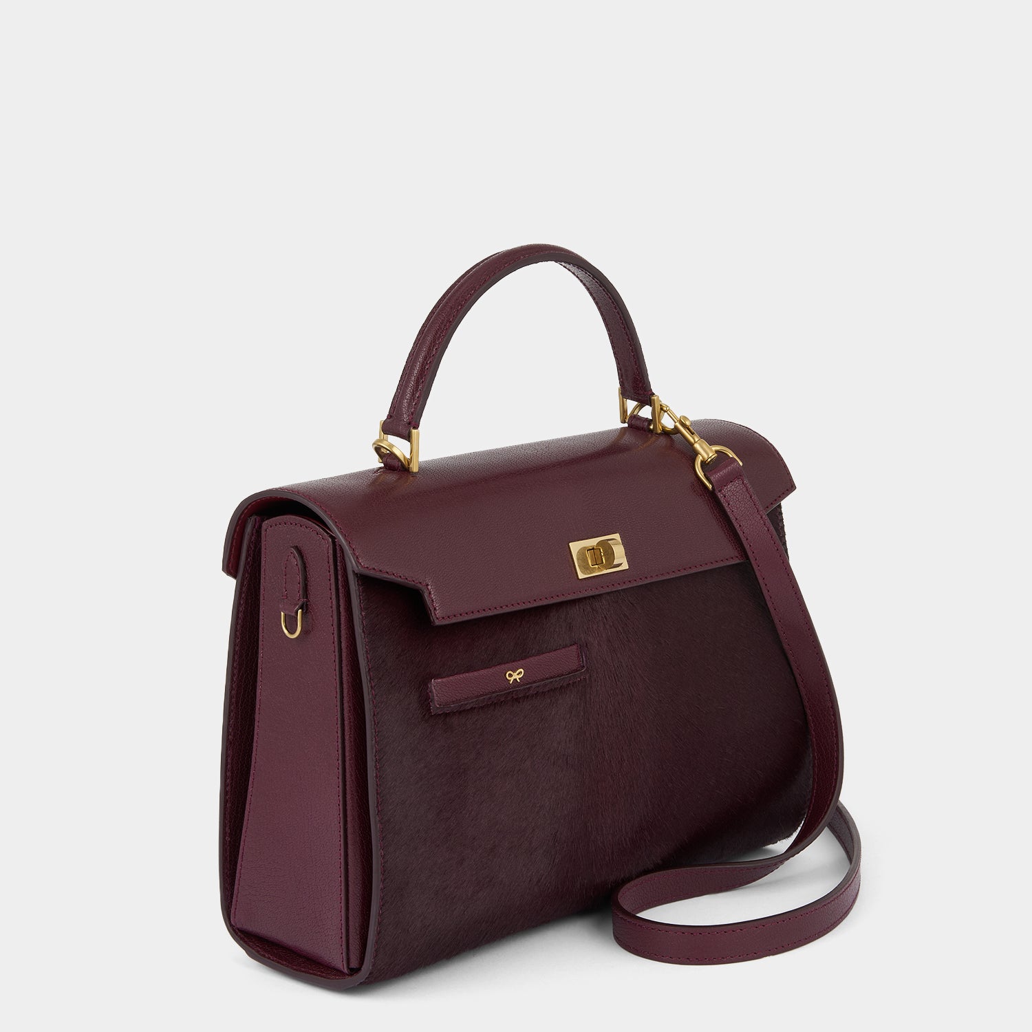 Mortimer Calf Hair Top Handle -

          
            Calf Leather in Burgundy -
          

          Anya Hindmarch UK
