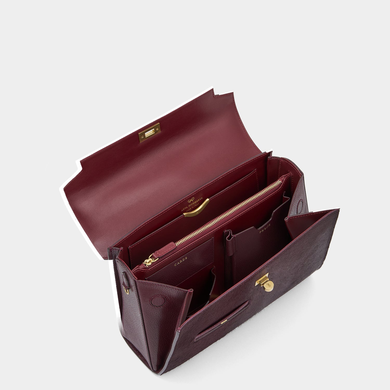 Mortimer Calf Hair Top Handle -

          
            Calf Leather in Burgundy -
          

          Anya Hindmarch UK
