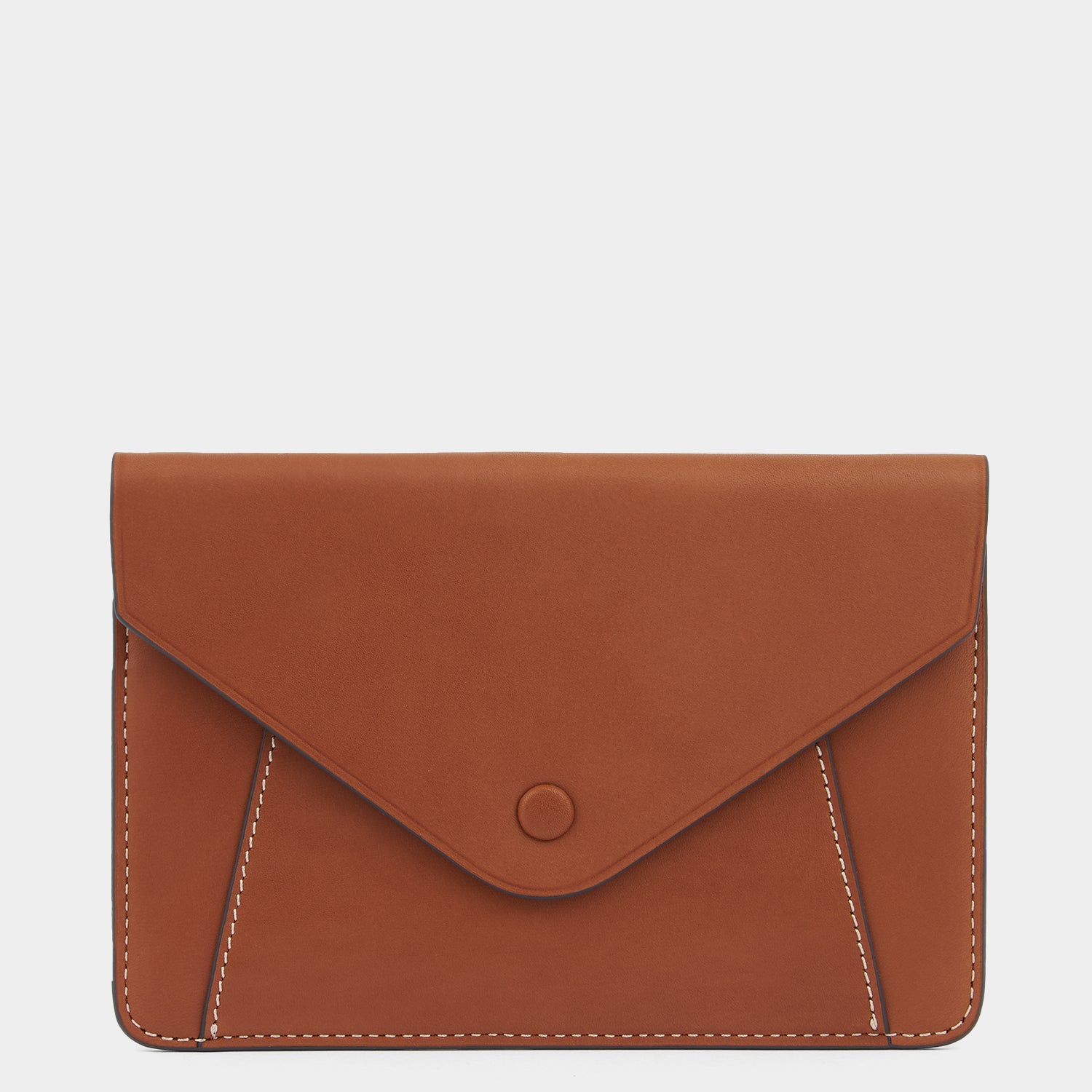 Envelope Passport Holder in Tan Butter -

          
            Capra in Tan -
          

          Anya Hindmarch UK
