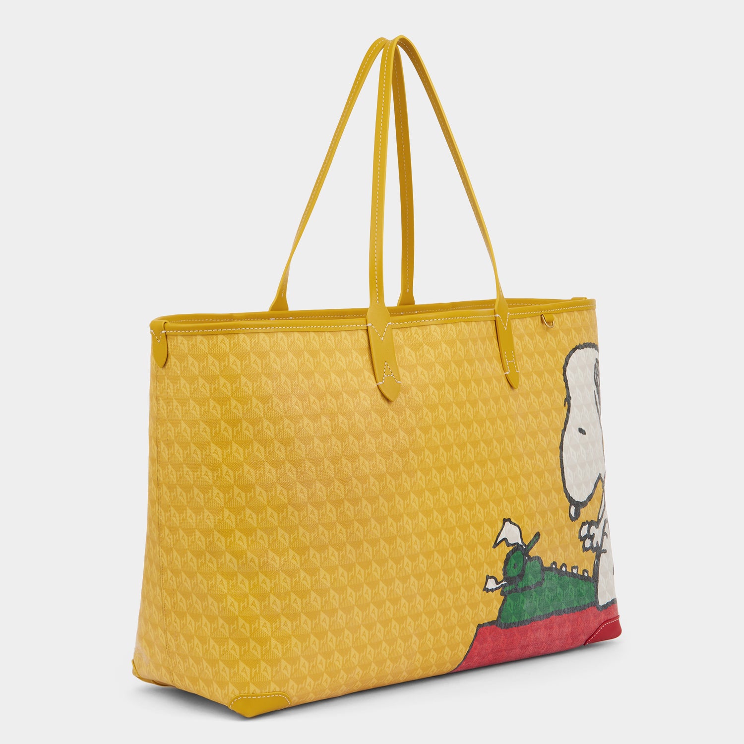 Peanuts I am a Plastic Bag Snoopy Tote -

          
            Recycled Canvas in Mustard -
          

          Anya Hindmarch UK
