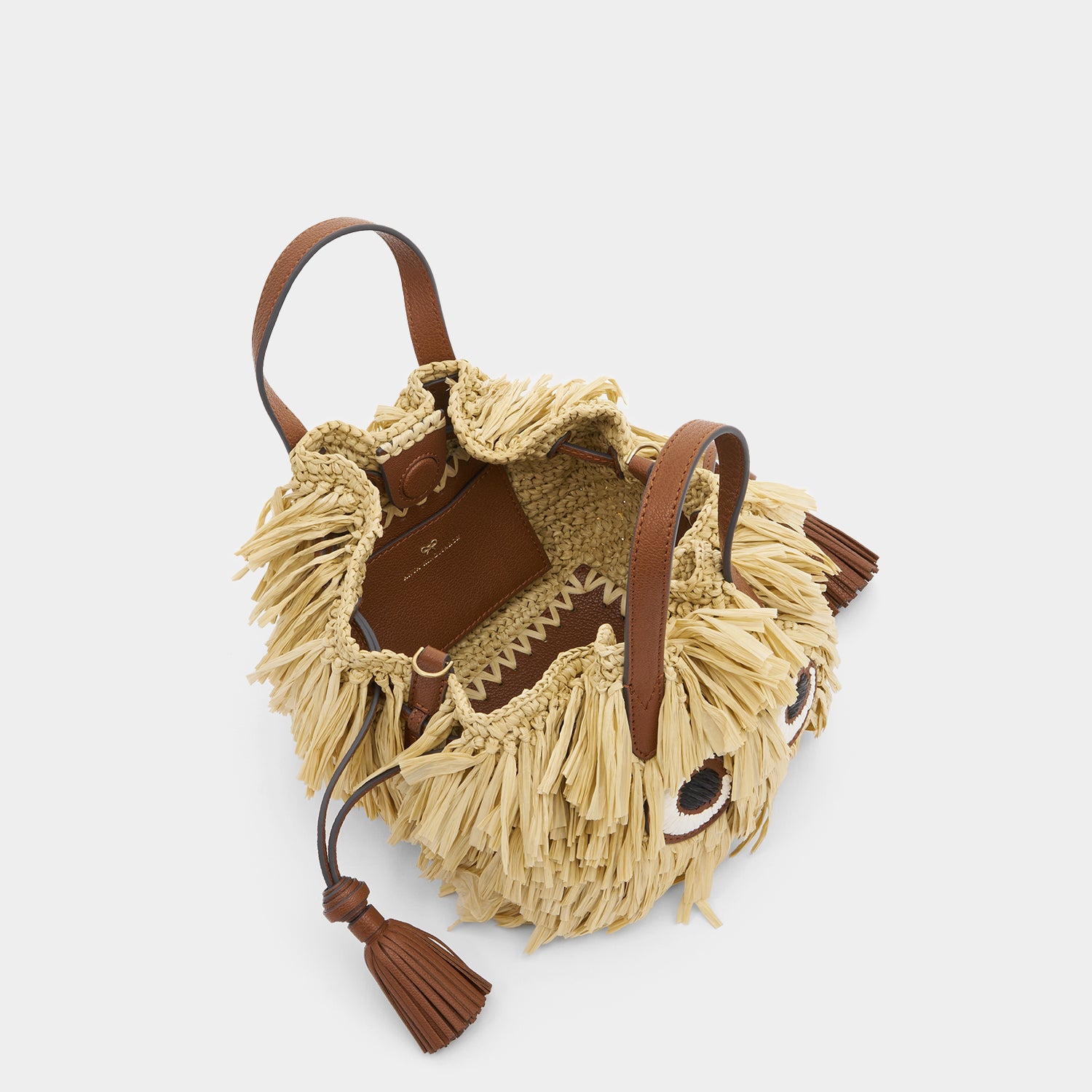 Raffia Eyes Small Drawstring Tote -

          
            Raffia in Natural -
          

          Anya Hindmarch UK
