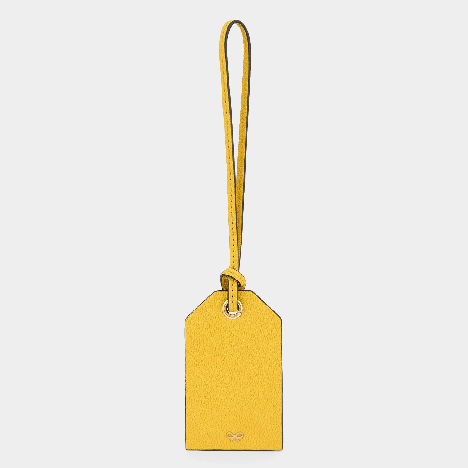 Caution Luggage Label Charm -

          
            Capra Leather in Yellow -
          

          Anya Hindmarch UK
