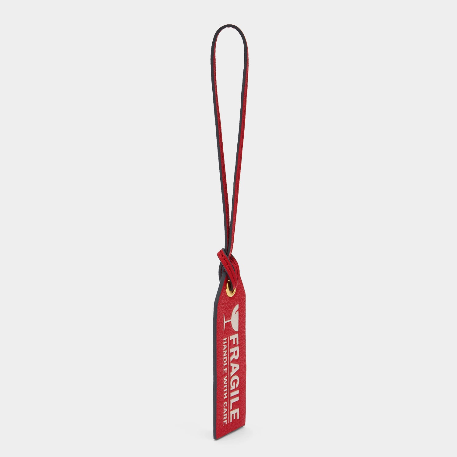 Fragile Luggage Label Charm -

          
            Capra Leather in Bright Red -
          

          Anya Hindmarch UK
