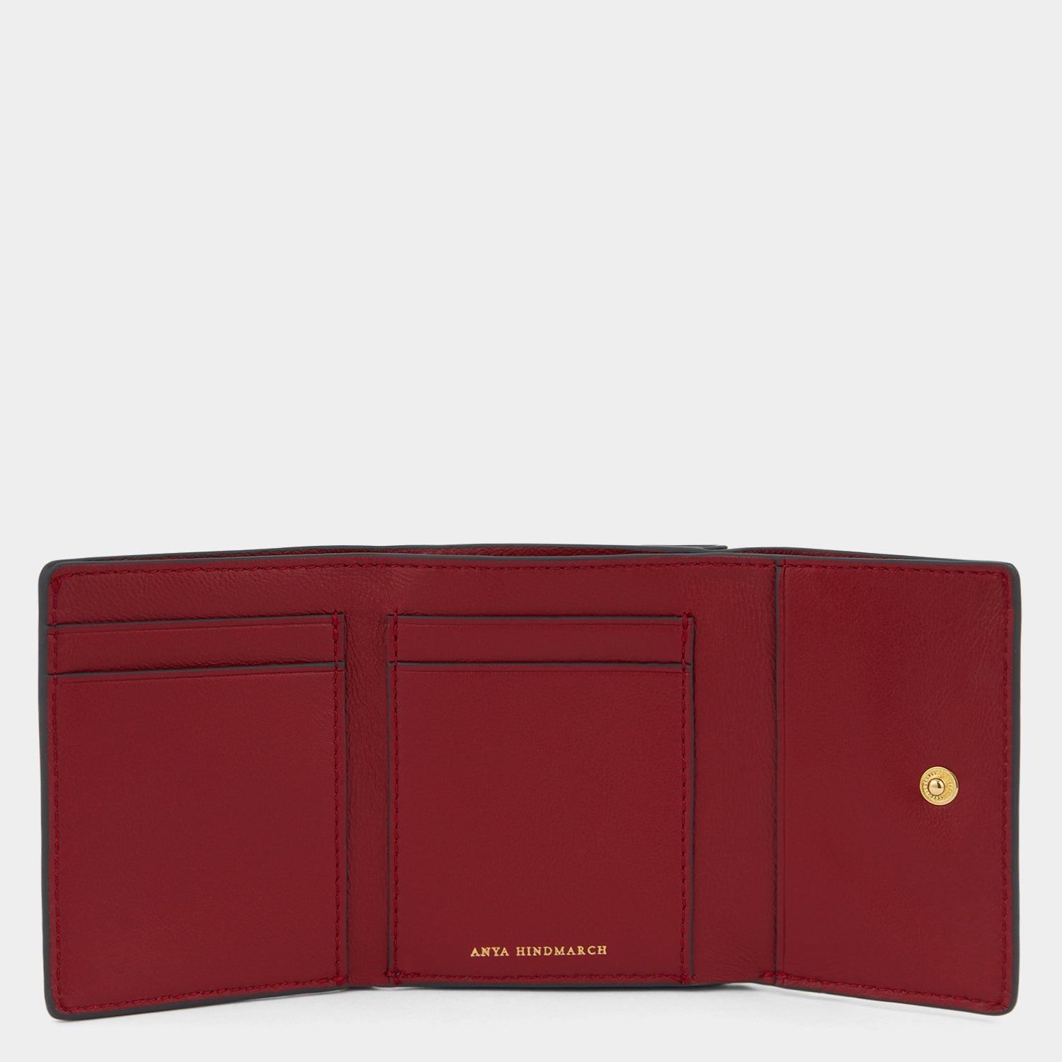 Snake Mini Trifold Wallet -

          
            Capra Leather in Grape -
          

          Anya Hindmarch UK
