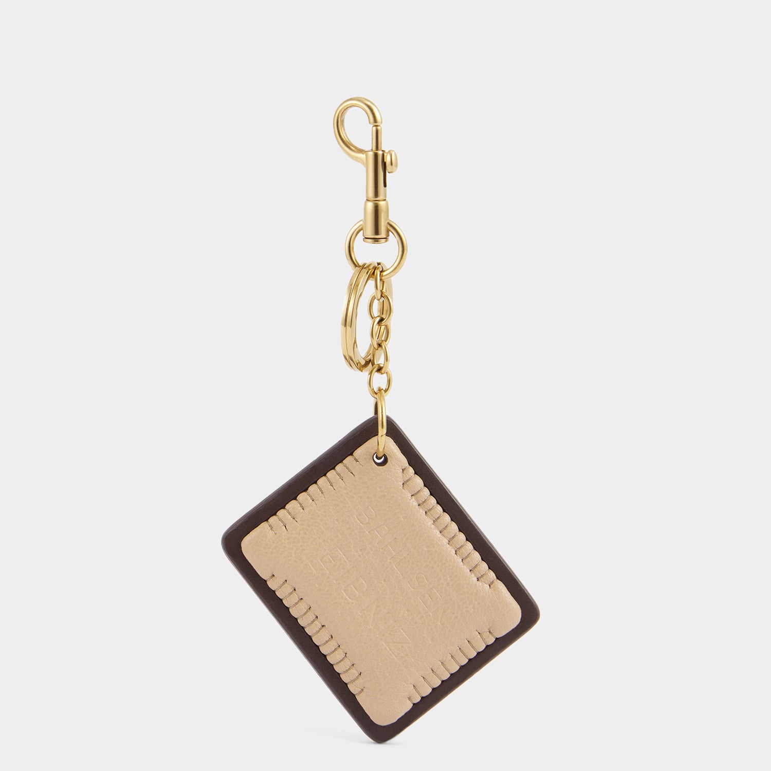 Anya Brands Choco Leibniz Charm -

          
            Capra Leather in Chocolate -
          

          Anya Hindmarch UK
