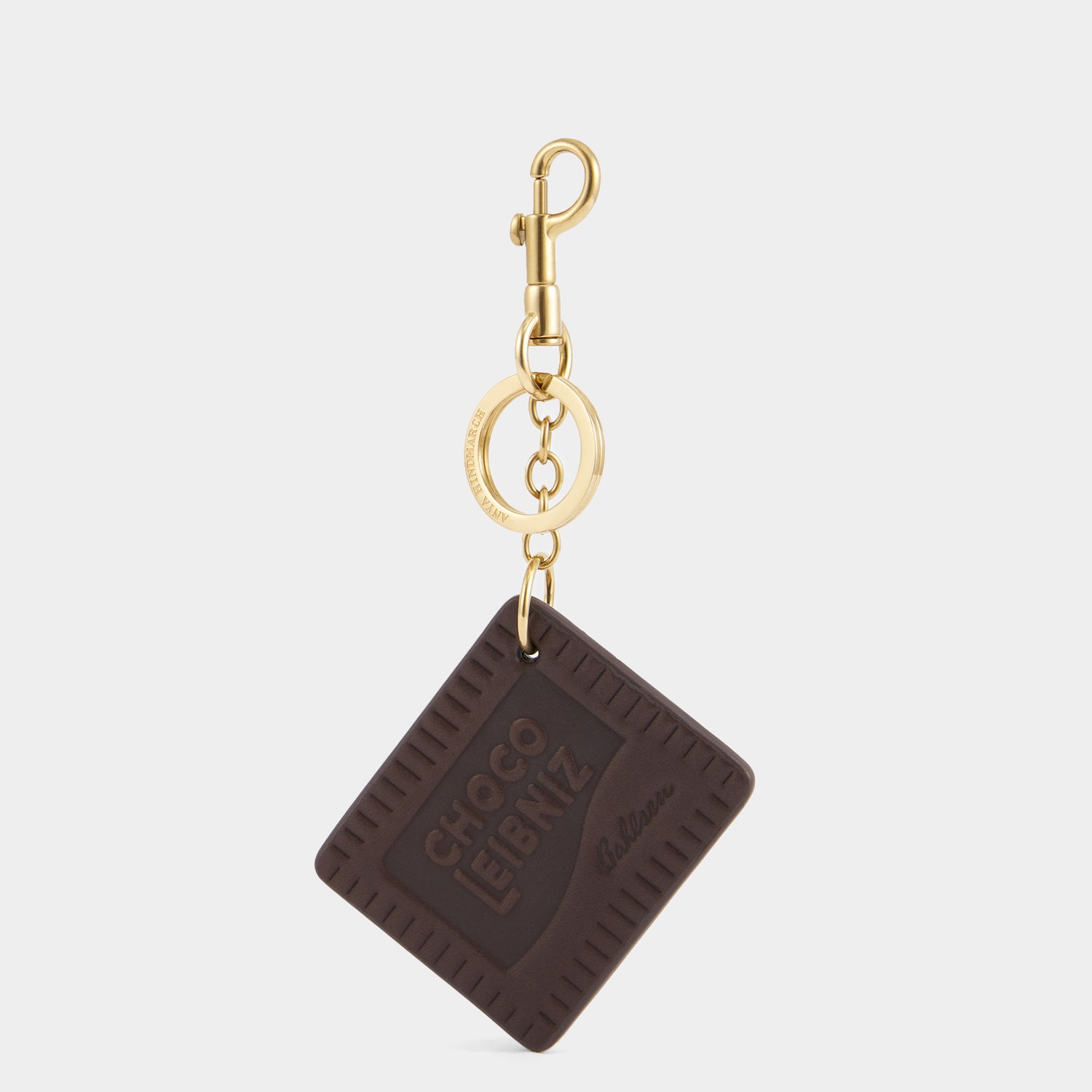 Anya Brands Choco Leibniz Charm -

          
            Capra Leather in Chocolate -
          

          Anya Hindmarch UK
