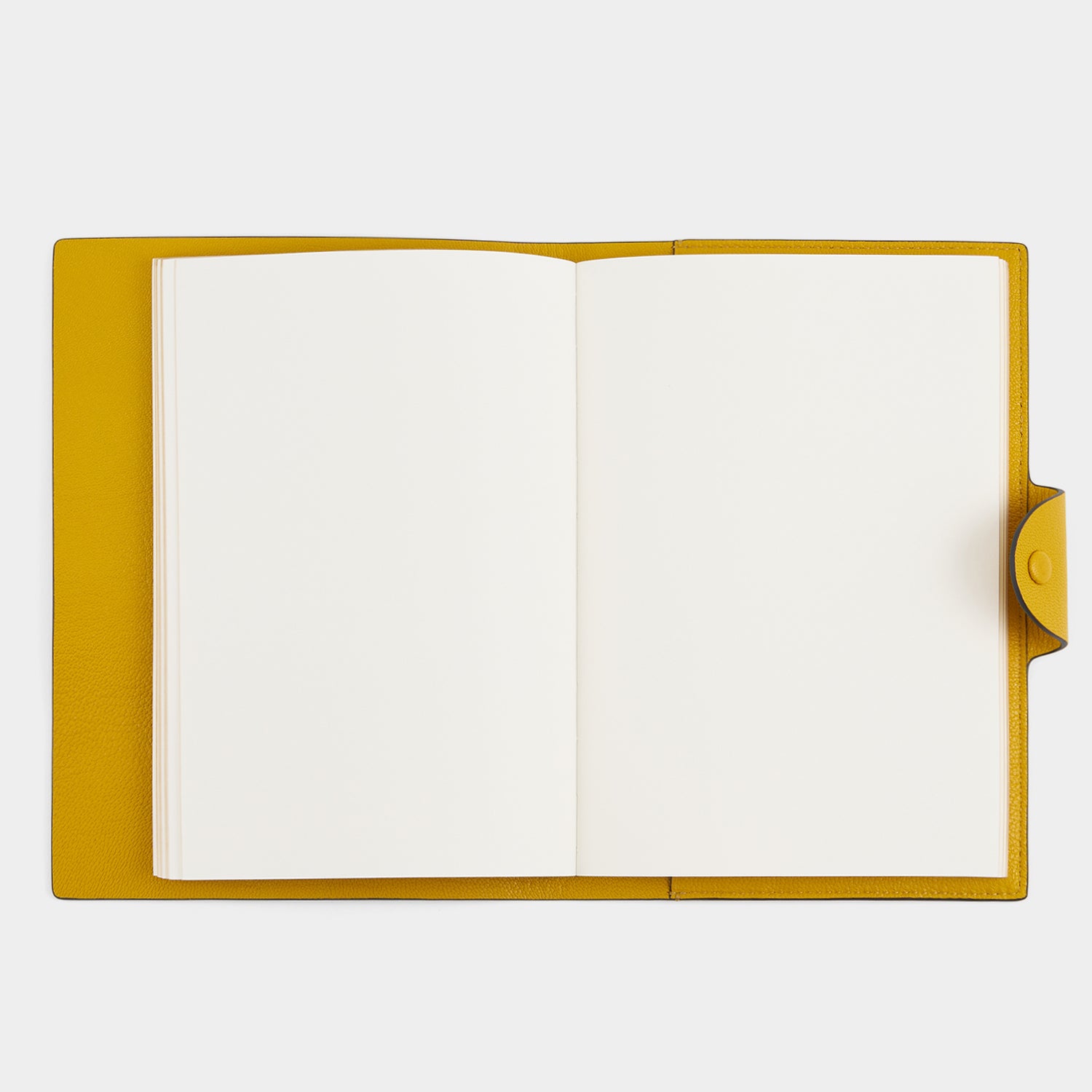 Wink A5 Journal -

          
            Capra Leather in Mustard Yellow -
          

          Anya Hindmarch UK
