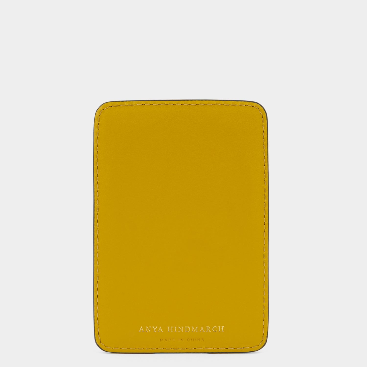 Wink MagSafe Card Case -

          
            Capra Leather in Mustard Yellow -
          

          Anya Hindmarch UK
