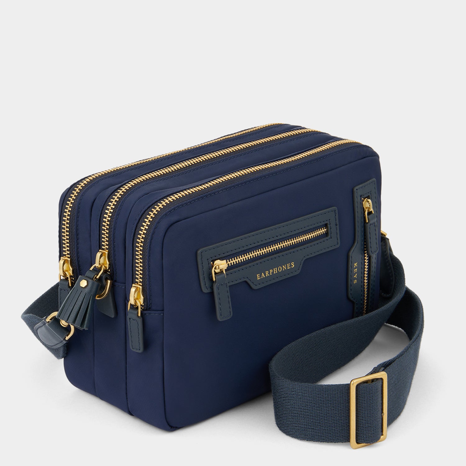 Trio Cross-body -

          
            Regenerated ECONYL® Nylon in Marine -
          

          Anya Hindmarch UK
