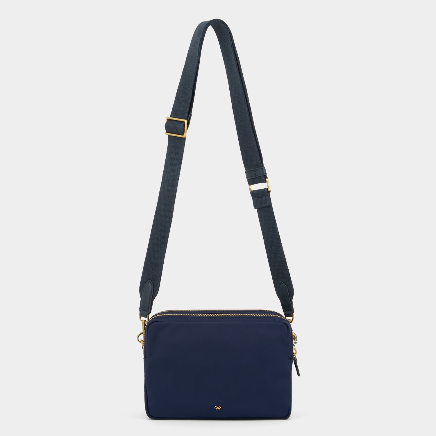 Trio Cross-body -

          
            Regenerated ECONYL® Nylon in Marine -
          

          Anya Hindmarch UK
