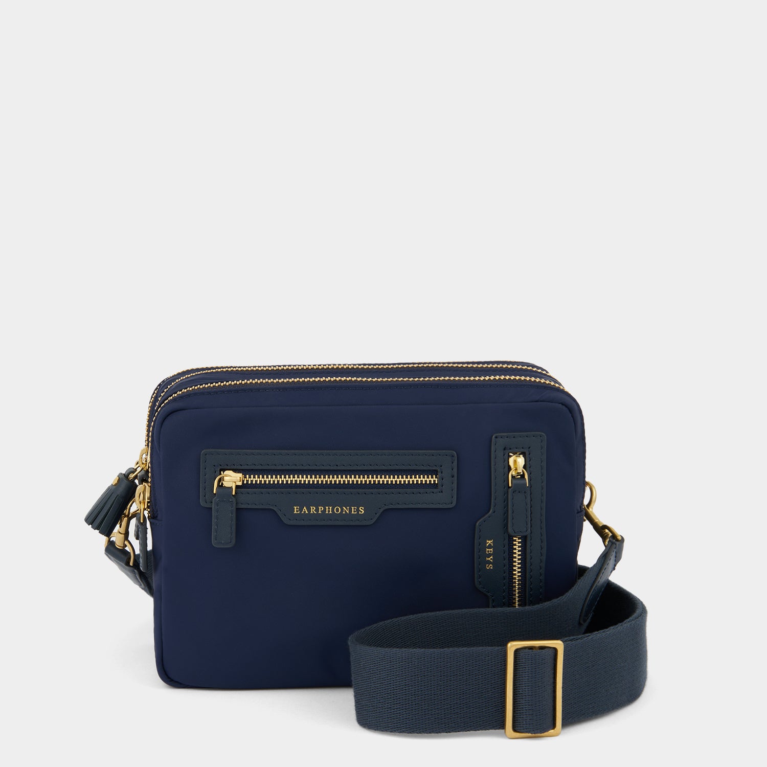 Trio Cross-body -

          
            Regenerated ECONYL® Nylon in Marine -
          

          Anya Hindmarch UK
