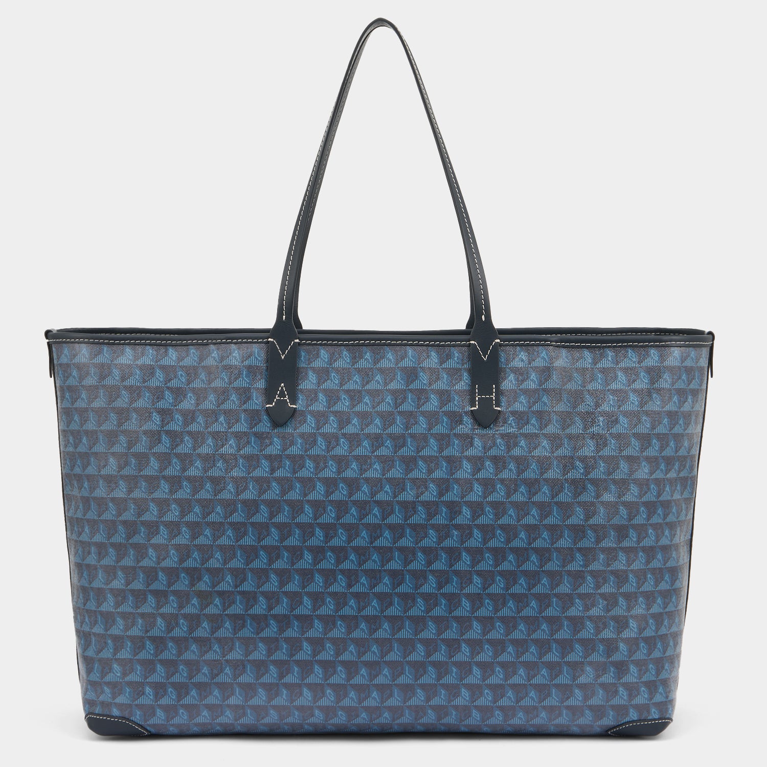 I am a Plastic Bag Wink Zipped Tote -

          
            Recycled Canvas in Marine -
          

          Anya Hindmarch UK
