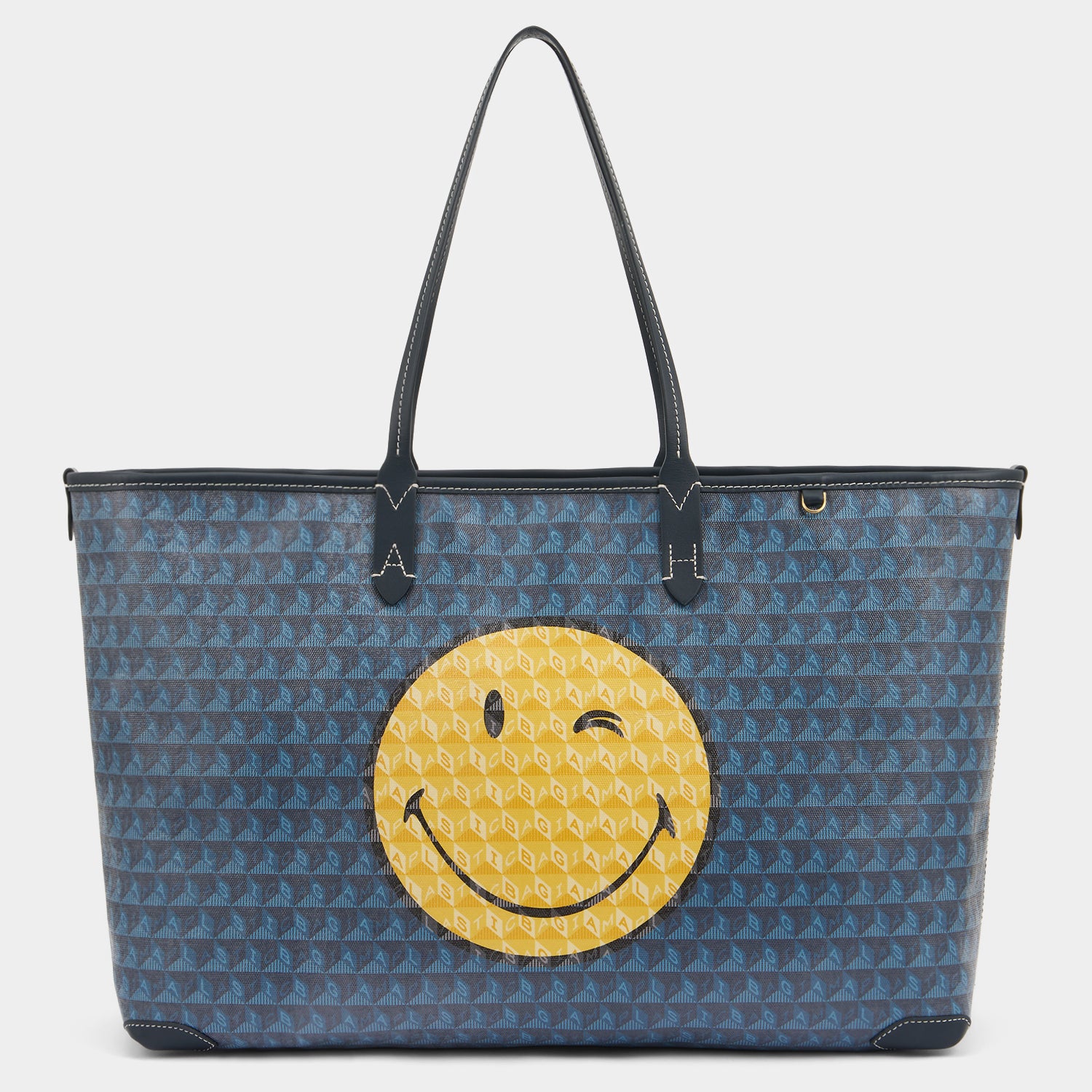 I am a Plastic Bag Wink Zipped Tote -

          
            Recycled Canvas in Marine -
          

          Anya Hindmarch UK
