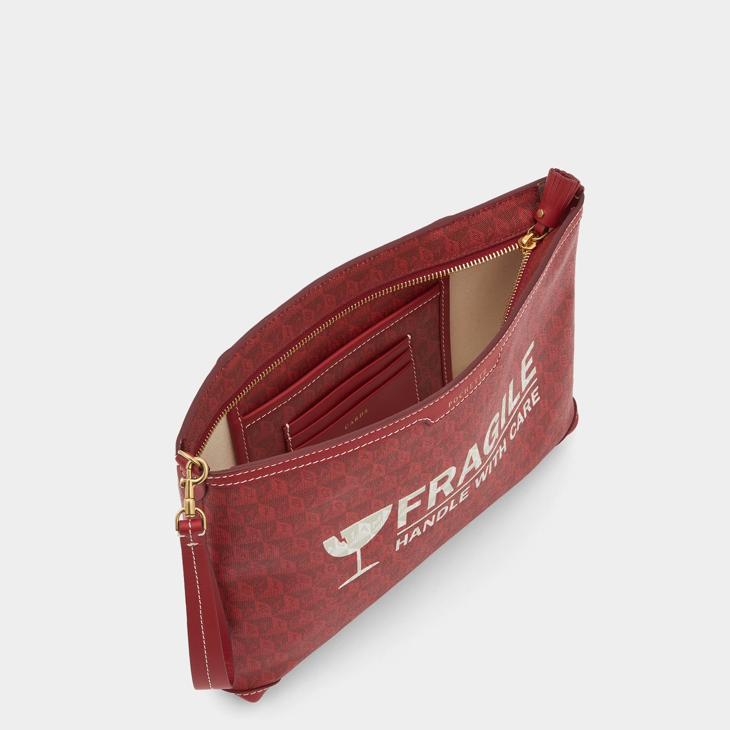 Fragile I am a Plastic Bag Pochette -

          
            Recycled Canvas in Vampire -
          

          Anya Hindmarch UK
