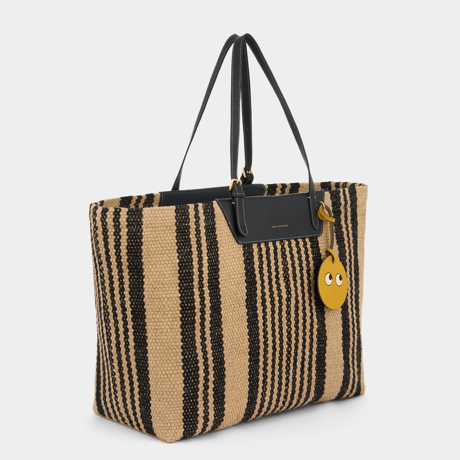 E/W Jute Tote -

          
            Jute/Goat Leather in Black/Natural -
          

          Anya Hindmarch UK
