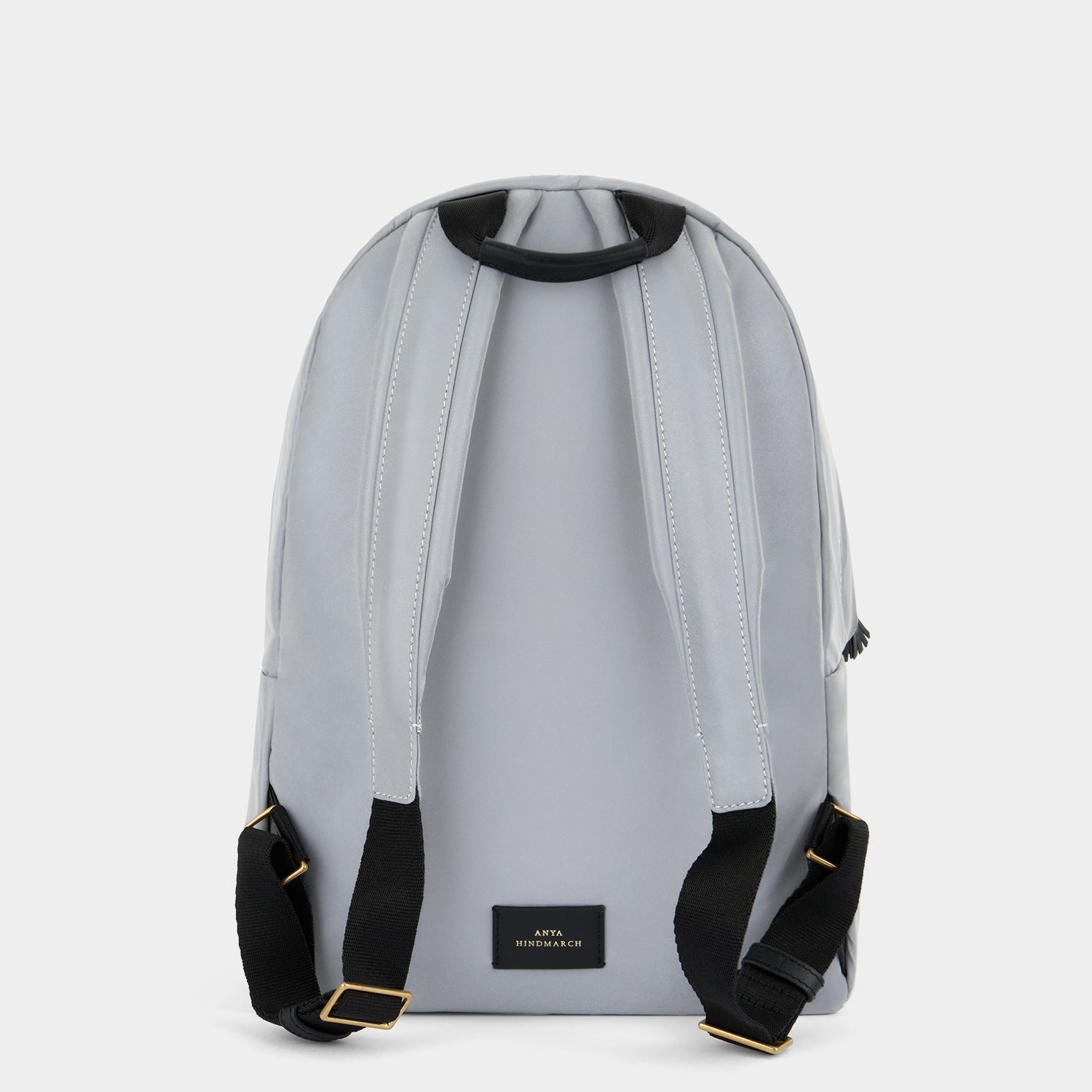 Small Eyes Backpack -

          
            Reflective Nylon in Silver -
          

          Anya Hindmarch UK
