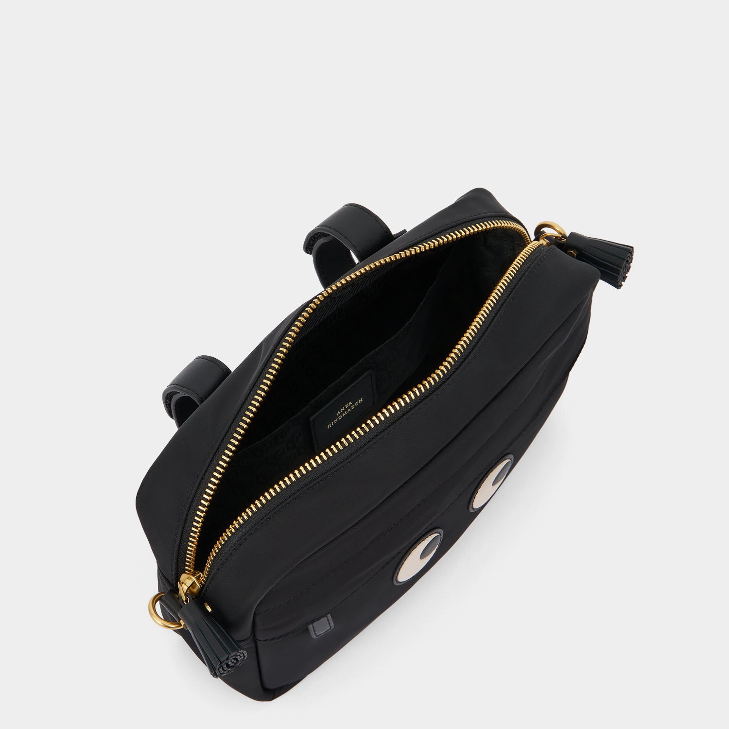 Eyes Handlebar Cross-body -

          
            Regenerated ECONYL® Nylon in Black -
          

          Anya Hindmarch UK
