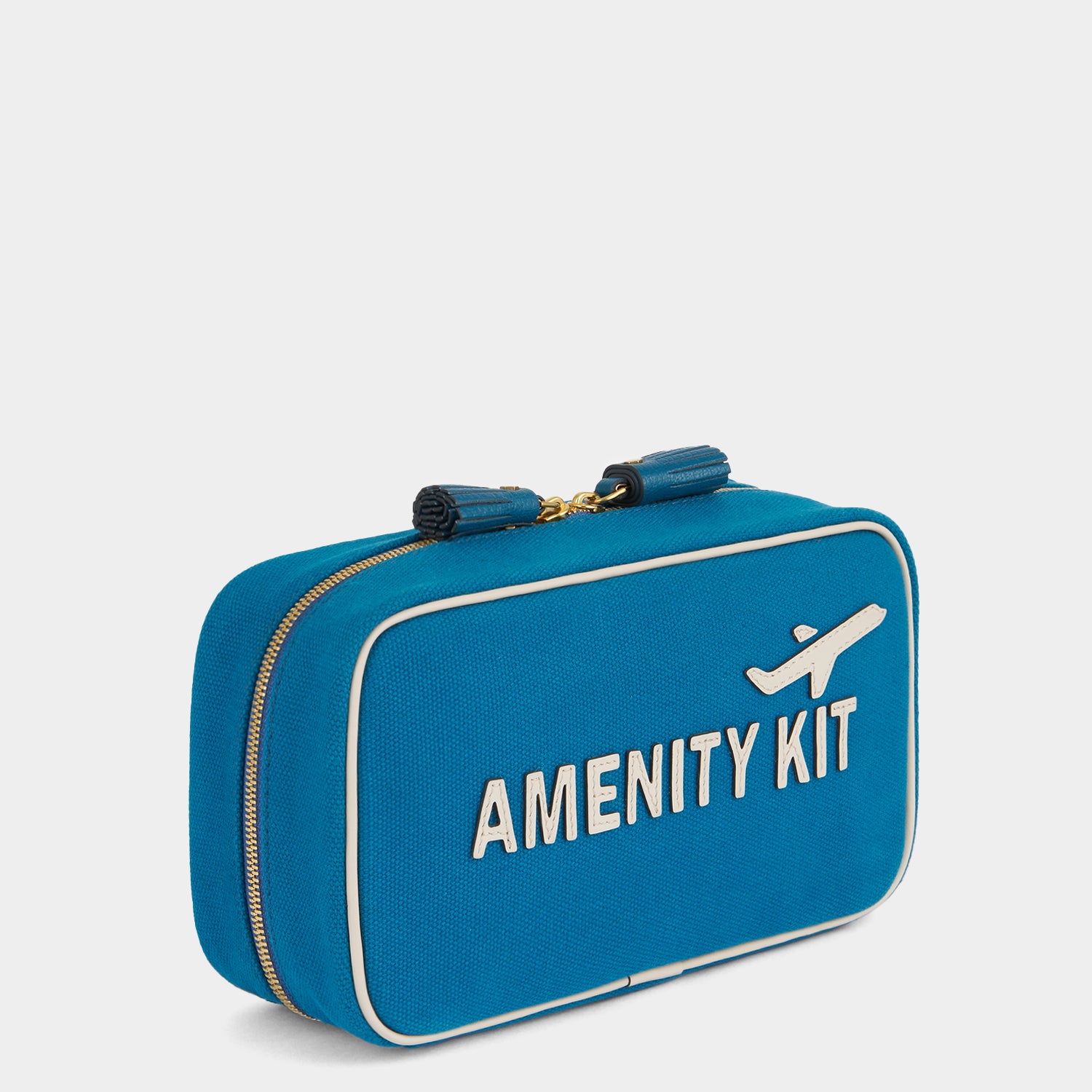 Amenity Kit Pouch -

          
            Recycled Canvas in Light Petrol Blue -
          

          Anya Hindmarch UK
